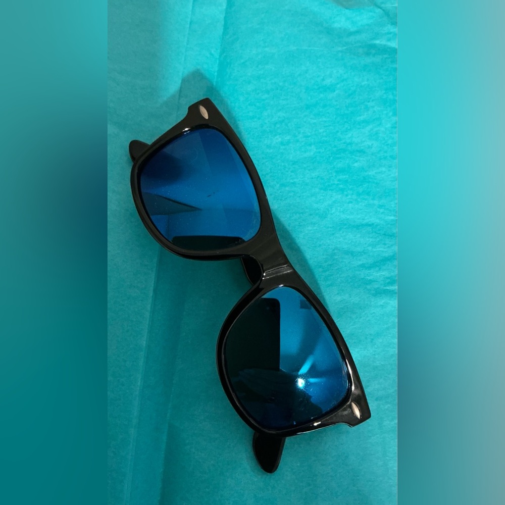 Stylish Black Sunglasses with Blue Lenses